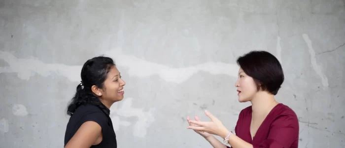founder chuen talking to client at acesence