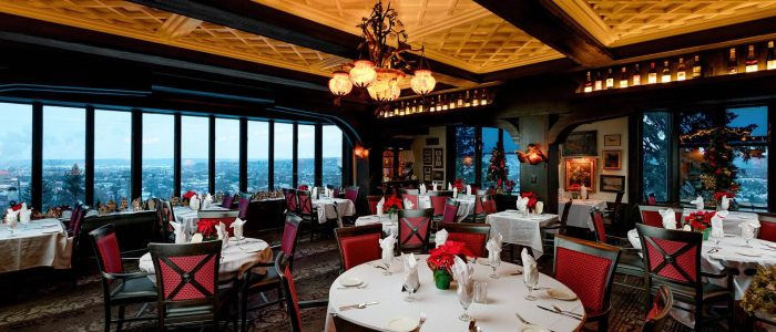 elegant dining with breathtaking city views in upscale restaurant.